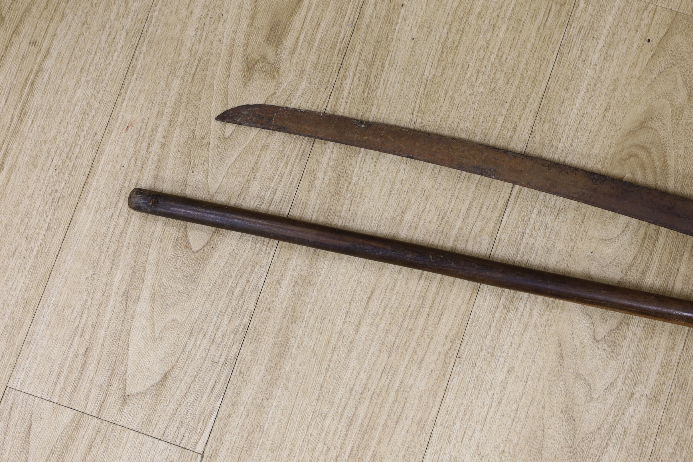 A Japanese wakizashi (corroded) with signed tang and a South African ebony knobkerrie, 80cm long